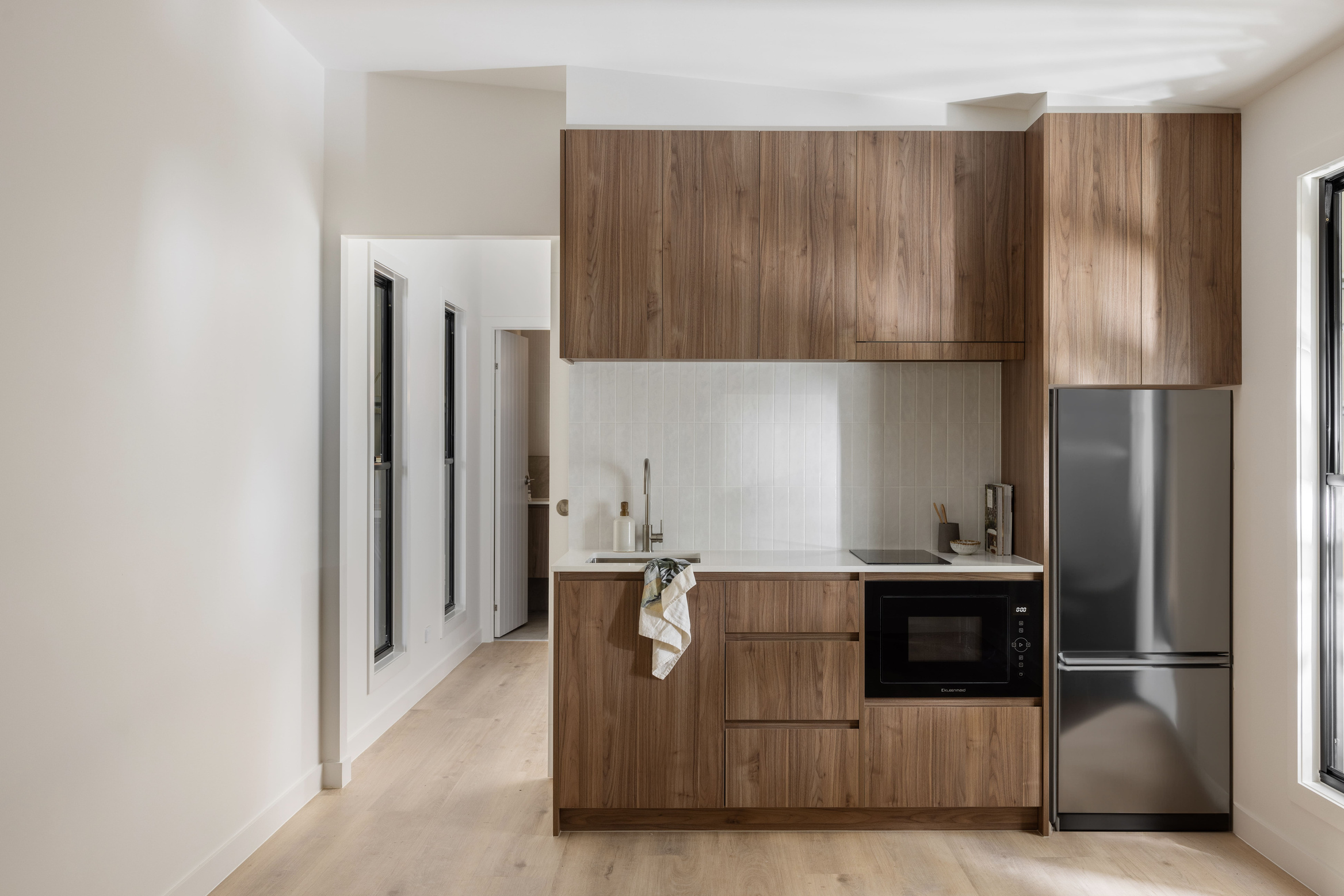 The kitchen and living space inside a completed Coast Modular home